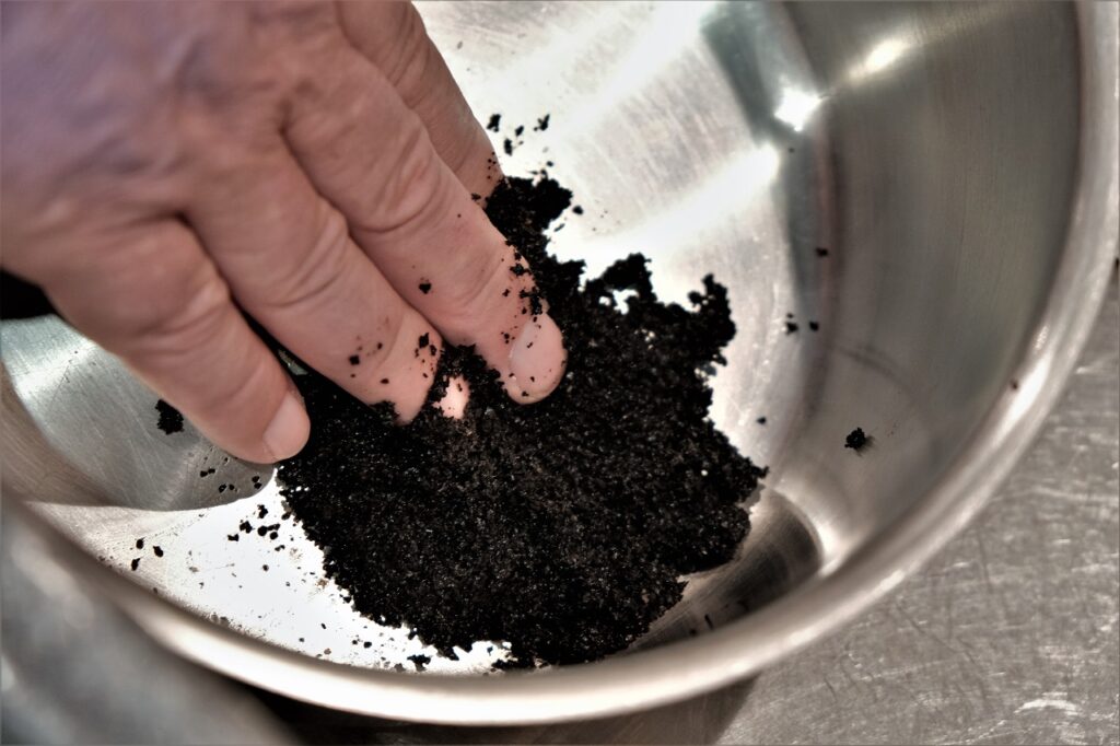 Using leftover coffee grounds as a cleaning scrub